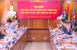 Tháo gỡ rào cản, thúc đẩy liên kết tài chính Việt - Lào