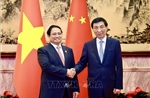 Thủ tướng Phạm Minh Chính hội kiến Chủ tịch Chính hiệp toàn quốc Trung Quốc Vương Hộ Ninh