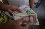 2 triệu rial mới đổi được 1 USD: Điều gì đang xảy ra với đồng tiền Iran?