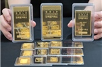 Giá vàng vẫn neo quanh mức đỉnh do rủi ro địa chính trị và Fed
