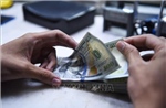 Đồng USD giữ vững đà tăng cả tuần bất chấp biến động địa chính trị