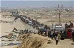 Dòng người Palestine khăn gói trở về quê nhà tan hoang ở Thành phố Gaza