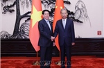 Chủ tịch nước Lương Cường hội kiến Ủy viên trưởng Nhân đại toàn quốc Trung Quốc Triệu Lạc Tế