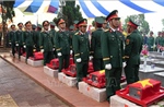 An táng 16 hài cốt liệt sĩ, quân tình nguyện Việt Nam hy sinh tại Lào và Campuchia