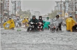 TP Hồ Chí Minh: Mưa lớn ngay giờ tan tầm, nhiều tuyến đường ngập sâu