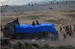 Xung đột Hamas-Israel: Các đoàn xe viện trợ bắt đầu di chuyển vào Gaza