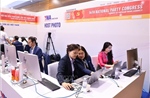 Phóng viên TTXVN tác nghiệp tại Đại hội XIV của Đảng