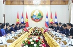 Thường trực Ban Bí thư Trần Cẩm Tú hội kiến Thủ tướng Lào Sonexay Siphandone