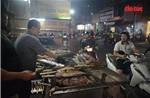 TP Hồ Chí Minh: Phố cá lóc thâu đêm đỏ lửa phục vụ ngày vía Thần Tài