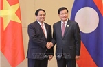 Thủ tướng gặp Tổng Bí thư, Chủ tịch nước Lào Thongloun Sisoulith