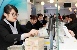 Nới điều kiện tiếp cận vốn vay cho doanh nghiệp