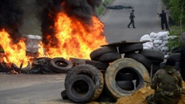 Kiev dùng trực thăng, xe bọc thép, tên lửa trấn áp người biểu tình