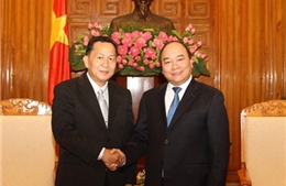 Phó Thủ tướng Nguyễn Xuân Phúc tiếp Đoàn đại biểu cấp cao TTX  Pathết Lào