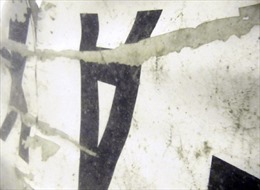 Ám ảnh mảnh vỡ máy bay QZ8501 dưới đáy biển