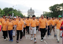 Lào tổ chức đi bộ kỷ niệm 48 năm thành lập ASEAN