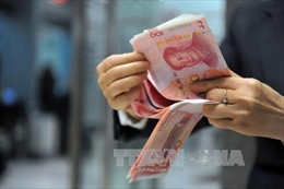 Trung Quốc giảm giá đồng NDT xuống thấp nhất gần 5 năm