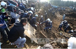 Mưa lớn ngăn cản cứu hộ động đất Nhật Bản