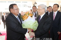 Báo chí Lào đưa đậm nét chuyến thăm của Tổng Bí thư Volachith 