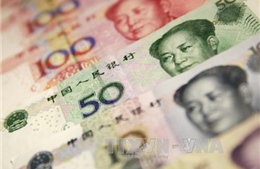 Trung Quốc ấn định tỷ giá tham chiếu đồng NDT thấp nhất 5 năm