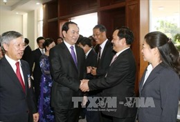 Chủ tịch nước gặp gỡ cộng đồng người Việt tại Lào
