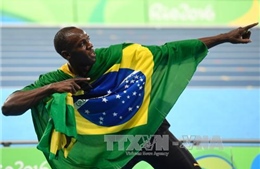 Usain Bolt hoàn tất “hat-trick”