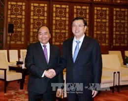 Thủ tướng Nguyễn Xuân Phúc hội kiến Ủy viên trưởng Trương Đức Giang