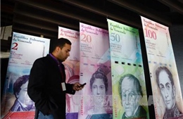 Venezuela tiếp tục lưu hành đồng 100 bolivar, lạm phát có thể lên 475% 