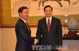 Đồng chí Võ Văn Thưởng gặp Trưởng ban Tuyên truyền Trung ương ĐCS Trung Quốc