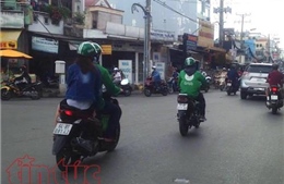 TP Hồ Chí Minh xử phạt gần 100 vụ vi phạm của Uber, Grab
