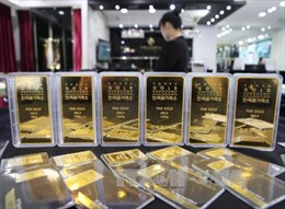 Giá vàng thế giới giảm tuần đầu tiên trong 5 tuần