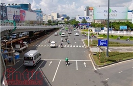 Hối hả hoàn thiện cầu vượt sân bay Tân Sơn Nhất trước ngày thông xe (3/7)