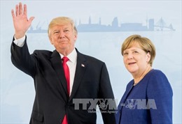 Cuộc gặp Trump-Merkel: Cái bắt tay chủ động