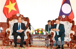 Thủ tướng Lào hài lòng với sự phát triển quan hệ của hai nước 