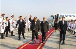 Tổng Bí thư, Chủ tịch nước Lào đến Hà Nội, bắt đầu chuyến thăm Việt Nam 