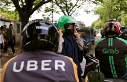 Uber bị Grab thâu tóm tại Đông Nam Á, lái xe và khách hàng lo ít lựa chọn