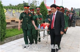 Truy điệu, an táng 25 hài cốt liệt sỹ quân tình nguyện Việt Nam hy sinh tại Lào