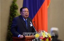 Tổng Bí thư, Chủ tịch nước Lào tiếp đoàn đại biểu cấp cao Đảng ta