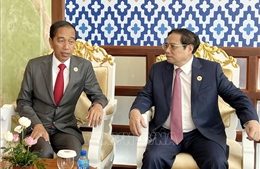Thủ tướng Chính phủ Phạm Minh Chính gặp Tổng thống Indonesia Joko Widodo 