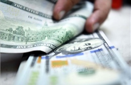 Giảm vào phiên cuối tuần, đồng USD vẫn hướng đến tuần tăng giá thứ ba liên tiếp