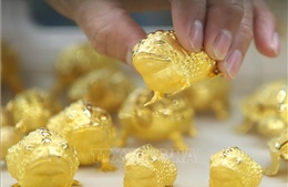 Giá vàng thế giới ghi nhận tuần tăng đầu tiên trong tháng qua