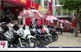 Người Việt giảm mua xe máy