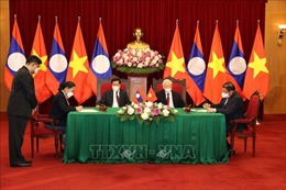 Tổng Bí thư Nguyễn Phú Trọng và Tổng Bí thư, Chủ tịch nước Lào chứng kiến Lễ ký kết văn kiện hợp tác giữa Việt Nam-Lào