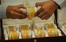 Giá vàng châu Á xuống mức thấp nhất trong gần hai tuần