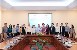 Tổng Giám đốc Thông tấn xã Việt Nam tiếp Đoàn đại biểu Báo Pasaxon (Lào)
