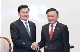 Thường trực Ban Bí thư tiễn Tổng Bí thư, Chủ tịch nước Lào và Phu nhân