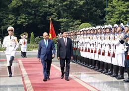 Lễ đón Thủ tướng CHDCND Lào Thongloun Sisoulith thăm chính thức Việt Nam