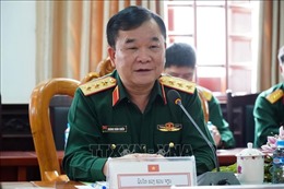 Việt Nam và Lào trao đổi chính sách quốc phòng