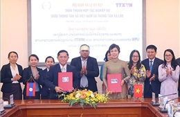 Tổng Giám đốc TTXVN Vũ Việt Trang hội đàm với Tổng Giám đốc Thông tấn xã Pathet Lào