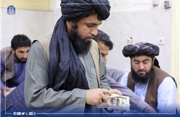 Afghanistan cạn kiệt tiền mặt từ trước khi Taliban nắm quyền
