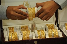 Giá vàng châu Á tăng trong phạm vi hẹp